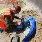 Vibration monitoring during construction using a seismograph to collect data. Data collected can be used to determine if damage due to vibrations has occurred to adjacent properties.