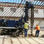 Drilling of Pier Foundations for Structural Bracing of Existing Wall